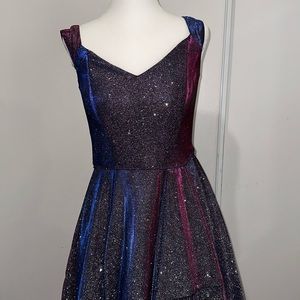 Blondie Nites off the shoulder gradient prom dress.